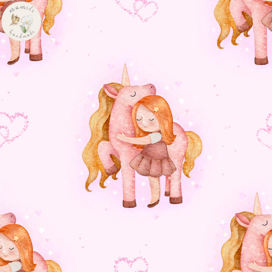 Biostoff Einhorn und Mädchen im rosa Hintergrund.