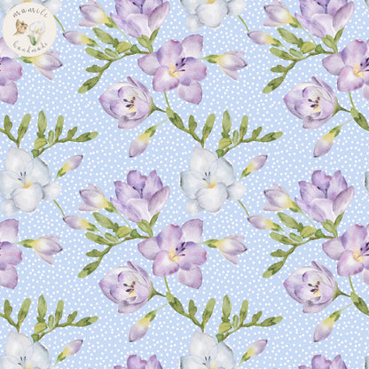 Stoff Floral lilac with blue dots.