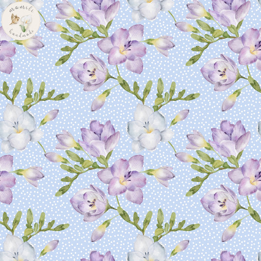 Stoff Floral lilac with blue dots.