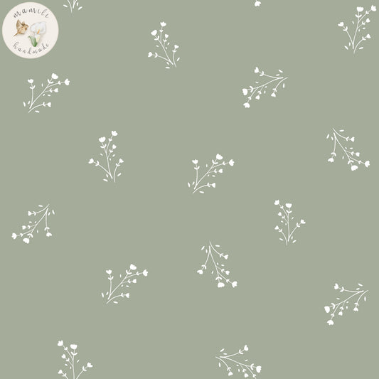 Motivstoff Blumen auf grünem Hintergrund.